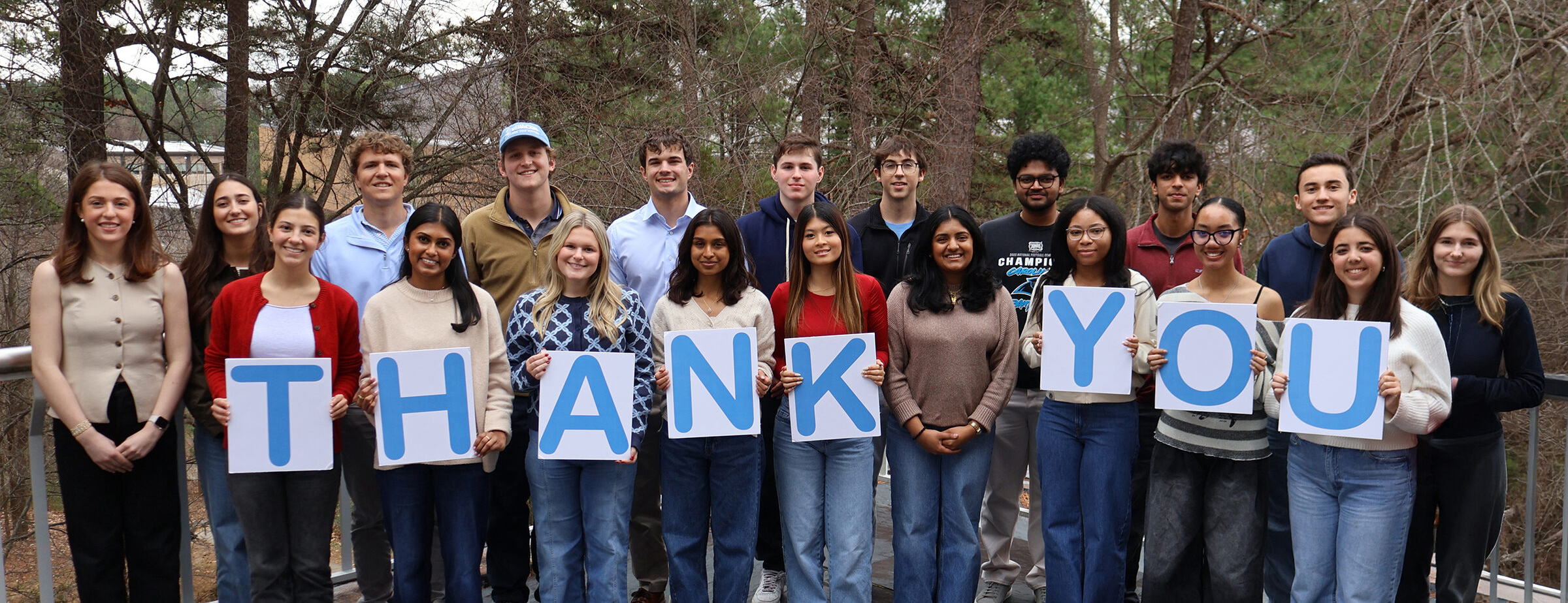 Luther Hodges Scholars holding thank you sign